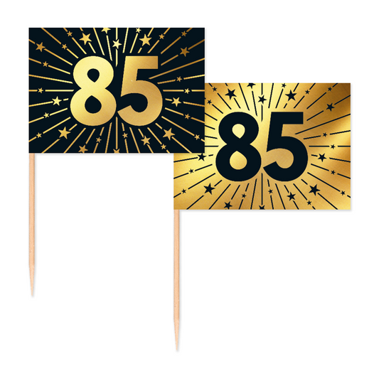 Vlagprikkers 85 jaar: zwart vlaggetje met goudfolie-opdruk en goud vlaggetje met zwarte opdruk, 50 stuks